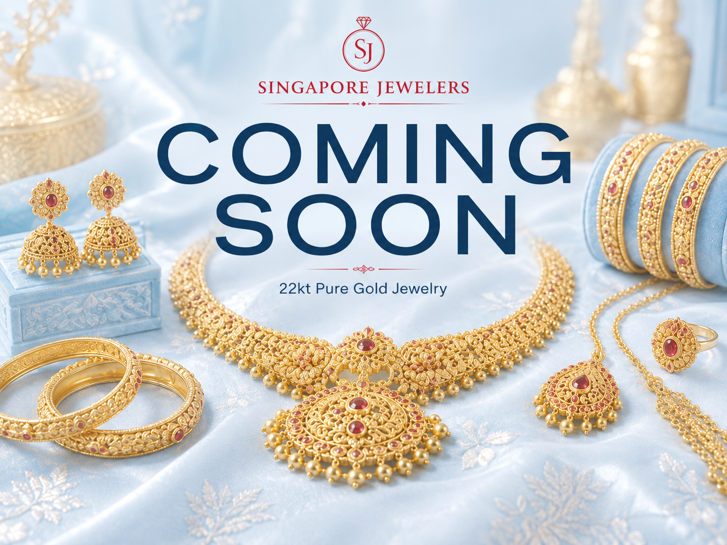 Singapore Jewelers coming soon, featuring traditional Indian 22kt gold necklaces, earrings, bangles, rings, and pendants on a light blue background.
